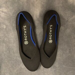 Rothy's Elegant Black Flats with Blue Trim